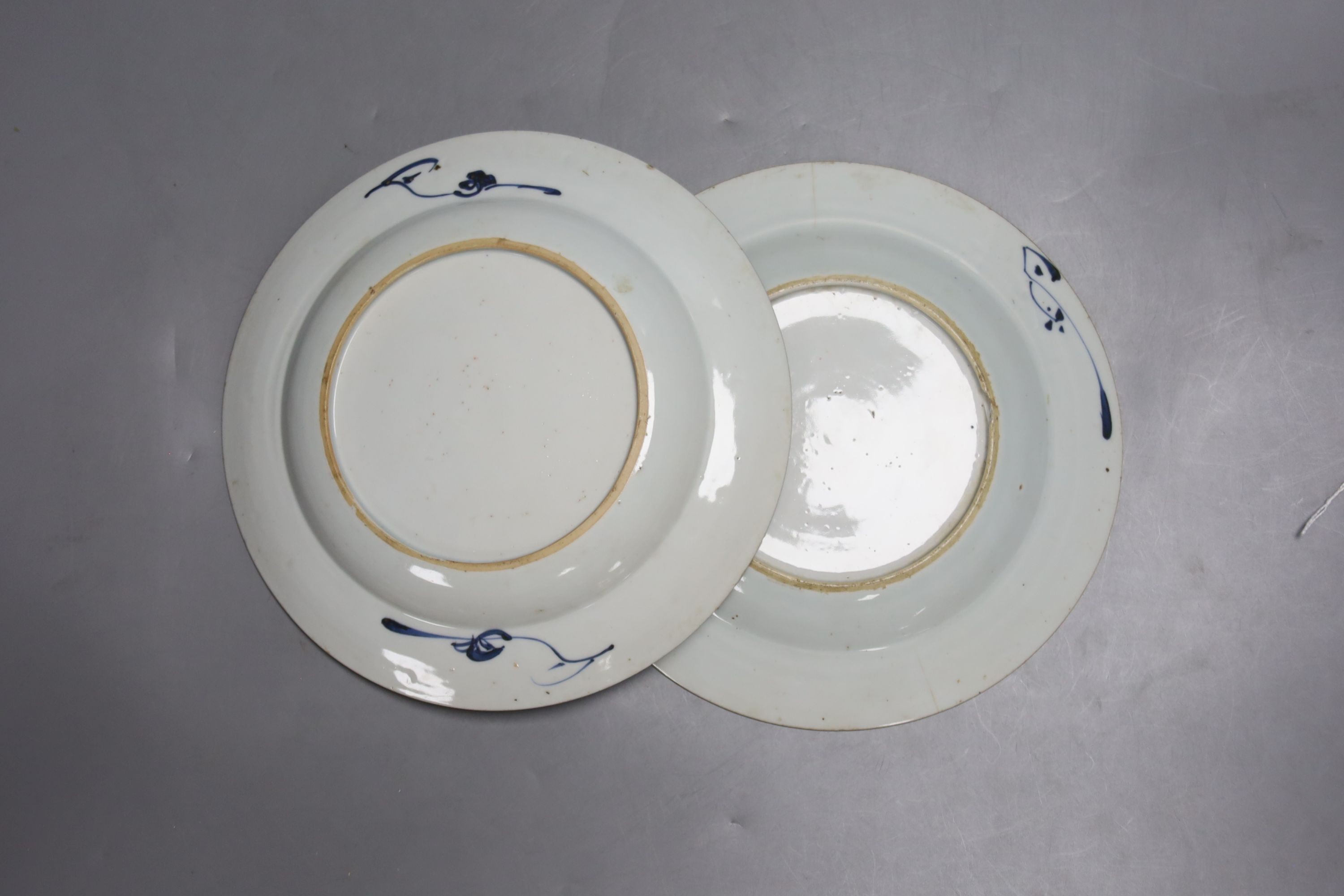 Two 18th century Chinese export blue and white plates, a pair of Chinese Imari patterned plates and four famille rose plates